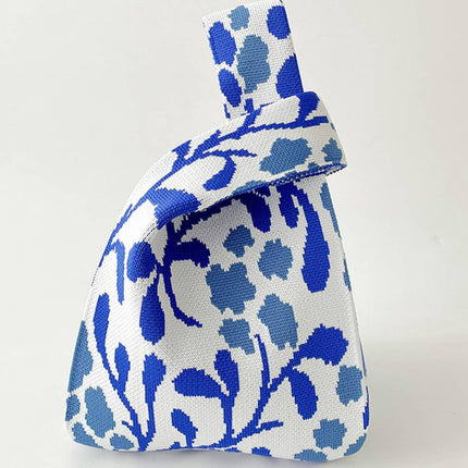 Knitted bag with blue floral pattern