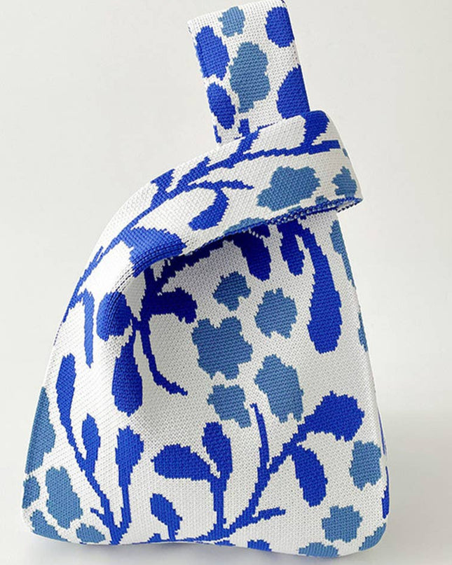 Knitted bag with blue floral pattern