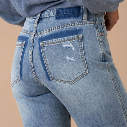 Distressed back pocket denim
