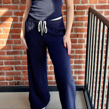 navy pinstripe trousers with elastic waistband tie